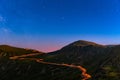 Transalpina road under a starry night