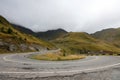 Transfagarasan highway mountain road with cloudy sky in autumn season.Europe, Romania Transfagasan road,Fagaras mountains.