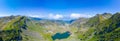 Transfagarasan road and balea lake viewed during a sunny day in Royalty Free Stock Photo