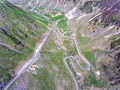 Transfagarasan Romania curved road trough the mountains. Aerial