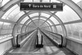 Transfer tunnel walkway to Railway Station in black and white Royalty Free Stock Photo