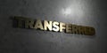 Transferred - Gold text on black background - 3D rendered royalty free stock picture