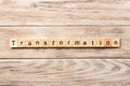 Transformation word written on wood block. transformation text on table, concept Royalty Free Stock Photo