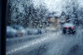 Transformed car window view freezing weather mixes rain and snow Royalty Free Stock Photo