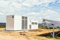 Transformer and inverter on solar panels background Royalty Free Stock Photo