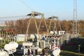 Transformer substation high voltage electrical network. Industrial energy. Metal structures in the open. Insulators and cable. Royalty Free Stock Photo