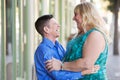 Transgender couple embracing each other