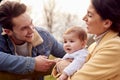 Transgender Family With Baby Enjoying Walk In Autumn Or Winter Countryside Royalty Free Stock Photo