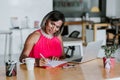 Transgender latin woman working with computer at the office in Mexico Latin America Royalty Free Stock Photo