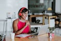 Transgender latin woman working with computer at the office in Mexico Latin America Royalty Free Stock Photo