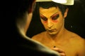 Transgender man, tabu concept image with man dressing up and putting make up