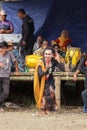 A transgender sinden singing Javanese songs to accompany the kuda lumping or ebeg dance which is a typical dance from the island Royalty Free Stock Photo