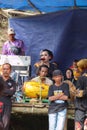 A transgender sinden singing Javanese songs to accompany the kuda lumping or ebeg dance which is a typical dance from the island Royalty Free Stock Photo