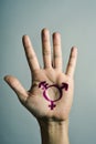 Transgender symbol in the palm of the hand