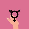 Transgender symbol on palm, hand holds sign