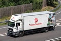 Transgourmet MAN TGM truck on motorway.