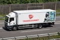 Transgourmet MAN TGM truck on motorway.