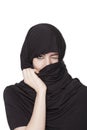 Transgressive girl wearing a burqa and uncovering Royalty Free Stock Photo