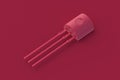 Transistor of magenta on red background. Electronic component Royalty Free Stock Photo