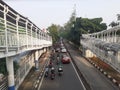 Transjakarta bus stop crossing bridge