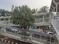 Transjakarta bus stop crossing bridge Royalty Free Stock Photo