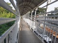 The Transjakarta bus stop crossing bridge Royalty Free Stock Photo