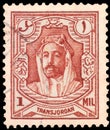 A stamp shows Royal families, Emir Abdullah ibn Hussein Royalty Free Stock Photo