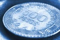 Translation: 500 Colombian pesos Republic of Colombia. Colombian coin 500 pesos close-up. Peso of Colombia. Blue tinted Royalty Free Stock Photo