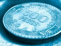 Translation: 500 Colombian pesos Republic of Colombia. Colombian coin 500 pesos closeup. Peso of Colombia. Light blue tinted Royalty Free Stock Photo