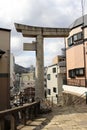 Translation: `The one-legged torii` shinto gate due to bombing.