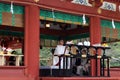 Translation: Shinto priests leading a wedding ceremony, at Tusurgaoka Shrine