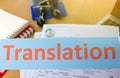 Translation word over blur office table Royalty Free Stock Photo