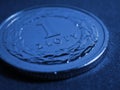 Translation: 1 zloty. Polish one zloty coin close-up. National currency and money of Poland. Dark blue tinted background for news Royalty Free Stock Photo
