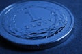 Translation: 1 zloty. Polish one zloty coin close up. National currency and money of Poland. Dark blue tinted background for news Royalty Free Stock Photo