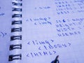 Translations of calculus systems on a notebook and black pen. creation of computer programs. work of the programmer and system Royalty Free Stock Photo