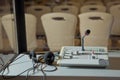 Soft focus of wireless Conference microphones and notebook in a meeting room. translators cubicle . interpreting - Microphone and Royalty Free Stock Photo