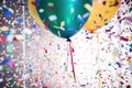 a translucent balloon revealing confetti inside