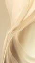 Translucent beige fabric elegantly flows in an abstract arrangement, creating soft curves and folds