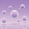 Translucent bubbles float against a soft purple gradient background. The bubbles vary Royalty Free Stock Photo