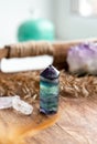 Translucent Fluorite crystal standing point gemstone in home bed room on natural wood tray.