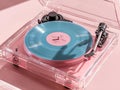 translucent pink record player with a teal vinyl record, minimalist setting, soft light Royalty Free Stock Photo