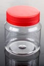 Translucent plastic PVC jar with red cover