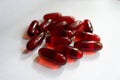 Translucent red capsules of krill oil