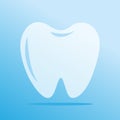 Translucent tooth isolated on blue gradient background.