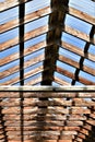 Translucent and wooden roof in a rustic setting.