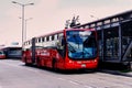 Transmilenio bus stopping at the station