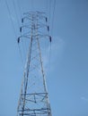 Transmission electrical tower on blue sky background