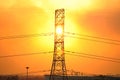 Transmission line tower and sunset Royalty Free Stock Photo