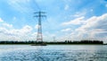 Transmission Lines crossing the Veluwemeer Lake supported by large Transmission Towers Royalty Free Stock Photo