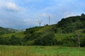 Transmission power line. A row of electricity pylons stretch across Carpathian mountains, in the Ukraine. Royalty Free Stock Photo